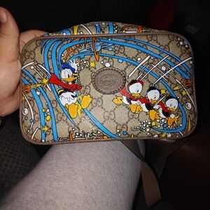 Gucci Brown Cartoon Print Wristlet